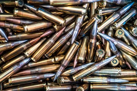 Bullets in firearms on a pile. background Stock-Fotos