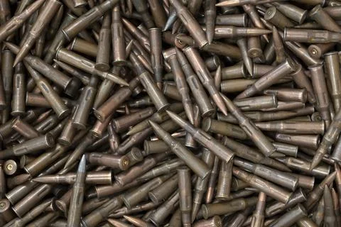 Bullets on table as background, close up view. Stock Photos