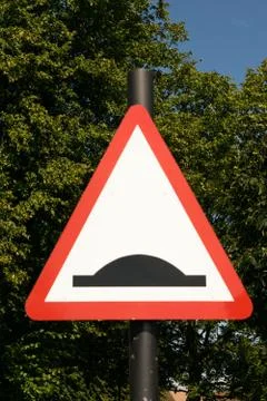 Bump warning traffic sign Stock Photos