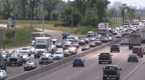Bumper to bumper traffic jam on highway 400 north of Toronto headed for cottage Stock Footage 52872668