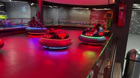 Bumper Car Game or Dodgem Car Game in a Play Area Stock Footage 254469896