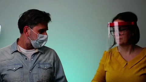 Bumping elbows gesture at workplace keeping social distance. Stock Footage 148781735