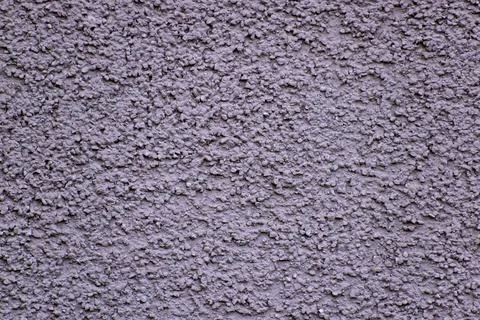 The bumpy abandoned crushing surface, massive thick layer. Gray rough cement  Stockfoto's