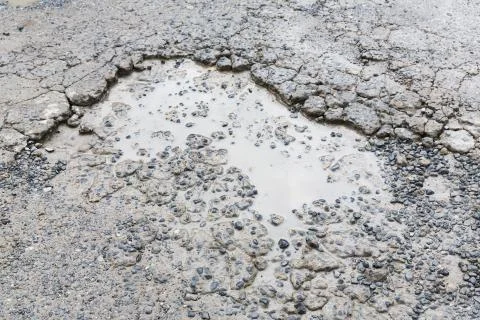 Bumpy concrete road Stockfoto's