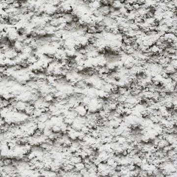 Bumpy concrete wall fragment 스톡 사진