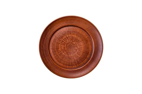 Bumpy empty ceramic plate on a textured concrete background Stock Photos