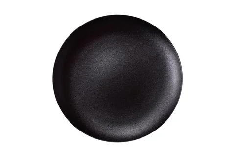 Bumpy empty ceramic plate on a textured concrete background 写真素材