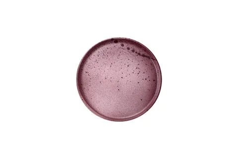 Bumpy empty ceramic plate on a textured concrete background 写真素材