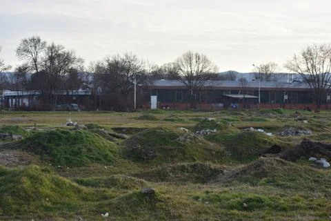 Bumpy field on a winter evening  Stock Photos