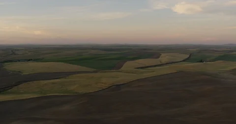 Bumpy green and brown topography, helicopter aerial, drone Stock Footage 115339958