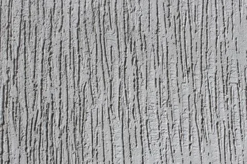 Bumpy plaster grey wall Stock Photos