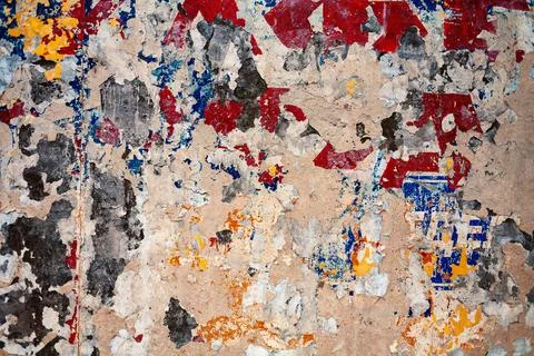 Bumpy plastered wall covered with mess of color spots Bumpy plastered wall... Stock Photos