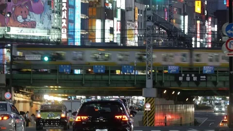 Bumpy ride throught tokyo light District Neon Shinjuku Stock Footage 80396189