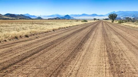 Bumpy road to success and through the african desert. Stock Photos