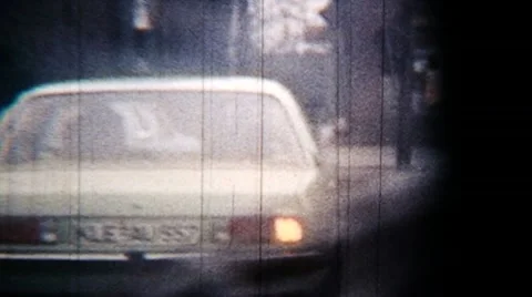Bumpy Road Trip City Street Car Window View - Vintage Super8 Film Stock Footage 8995335