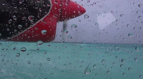Bumpy seaplane flight on rainy day Stock Footage 17483599