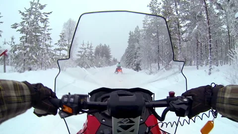 A bumpy snowmobile ride in the Swedish mountains. Two persons. Point of view. Video stock 159200284