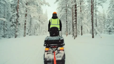 Bumpy snowmobile ride through winter wonderland in Rovaniemi, Lapland, graded Stock Footage 284036663