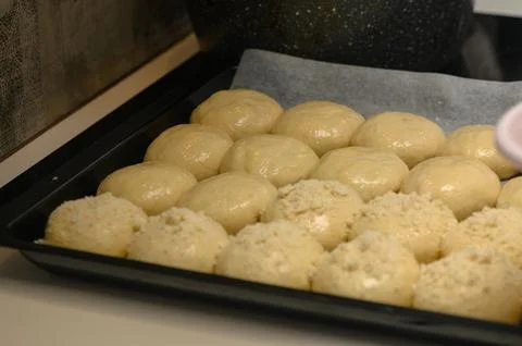 Bun blanks on a baking sheet 3 Stock Photos