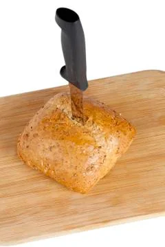 Bun bread with knife Stock Photos
