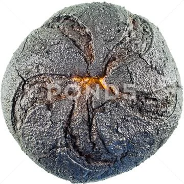 Bun burnt with a black crust. Charred bread. Wallpaper Stock Photos