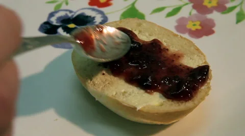 Bun with butter and jam Stock Footage 46533868