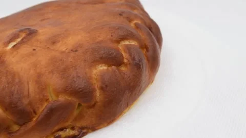 Bun filled with meat on gray background Stock Footage 277151578