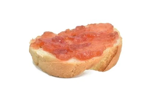Bun with jam on a white background. Stock Photos