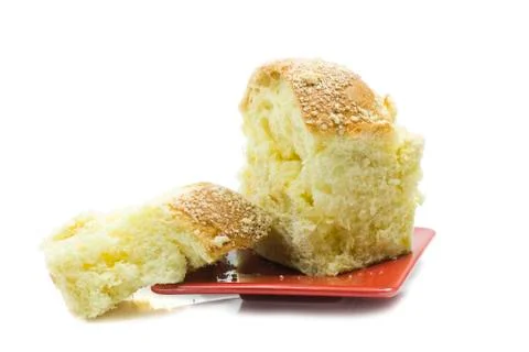 Bun on red plate Stock Photos
