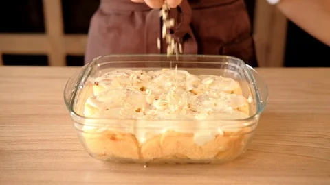 Bun rolls cooking recipe chef adding almond flakes Stock Footage 112220967