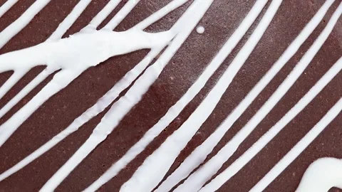 Bun round with chocolate glaze, rotating, turning 스톡 동영상 243992952