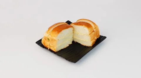 Bun with some maska, which is a mixture of butter and cream, Pune, Maharash.. Stock Photos