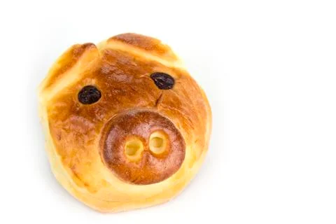 Bun with sweet stuffing in shape of pig head Stock Photos