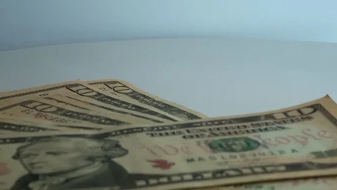 Bunch of 10 dollar bills in motion Video stock 95599090