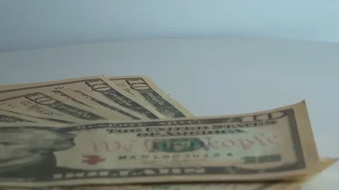 Bunch of 10 dollar bills in motion Stock Footage 106002088