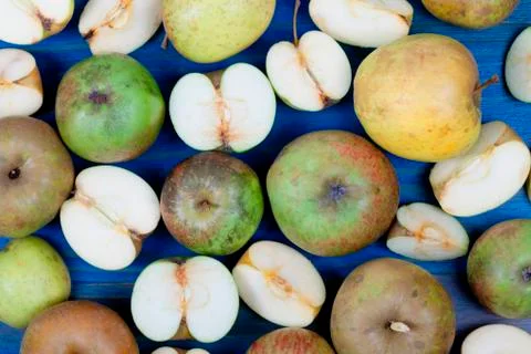 A bunch of apples on a blue background Stock Photos