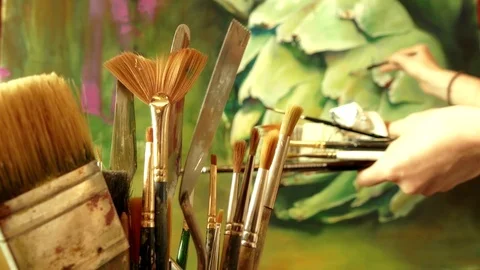 A bunch of art paint brushes on background of professional artist working Stock Footage 82787830