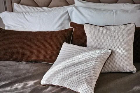 Bunch of assorted pillows Photos