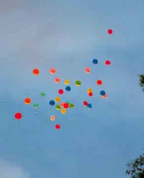 Bunch of balloons floating in sky Foto stock