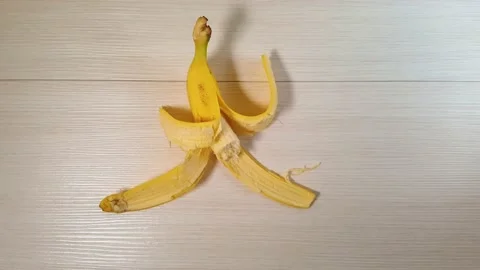 A bunch of bananas are on the table. Stop motion footage. Bananas disappear in Video stock 143821354