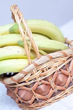 Bunch of bananas in basket Stock Photos