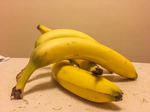 Bunch of bananas on the table Stock Photos