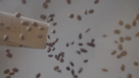 A bunch of beans are falling from the sky Video stock 306043684