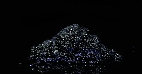 A bunch of black caviar on the table slowly rotates. Stock Footage 131067140