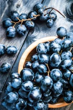 Bunch of black grapes Stock Photos