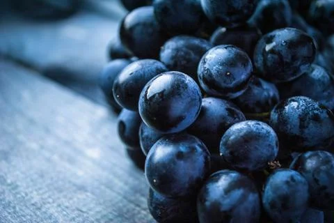Bunch of black grapes Stock Photos