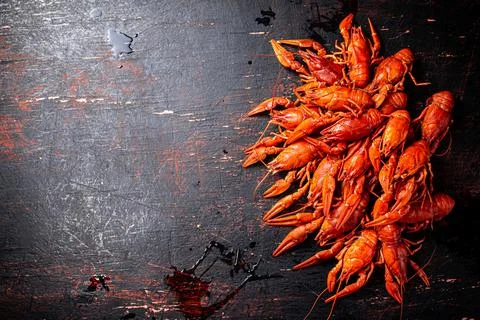 A bunch of boiled crayfish on the table. Stock Photos