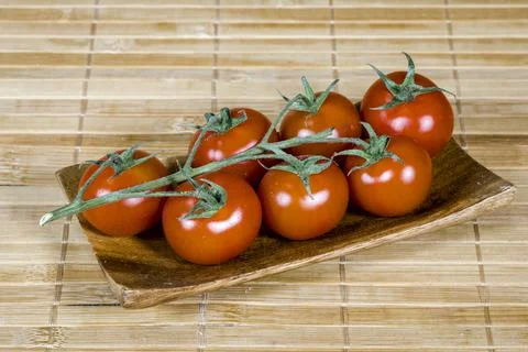 Bunch of branch tomatoes Stock Photos