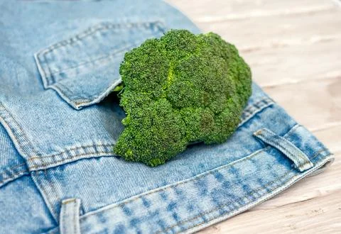 Bunch of broccoli cabbage close-up. The concept of weight loss vegetables. Stock Photos