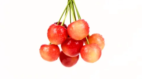 A bunch of cherries vibrates like a pendulum. Stock Footage 157128625